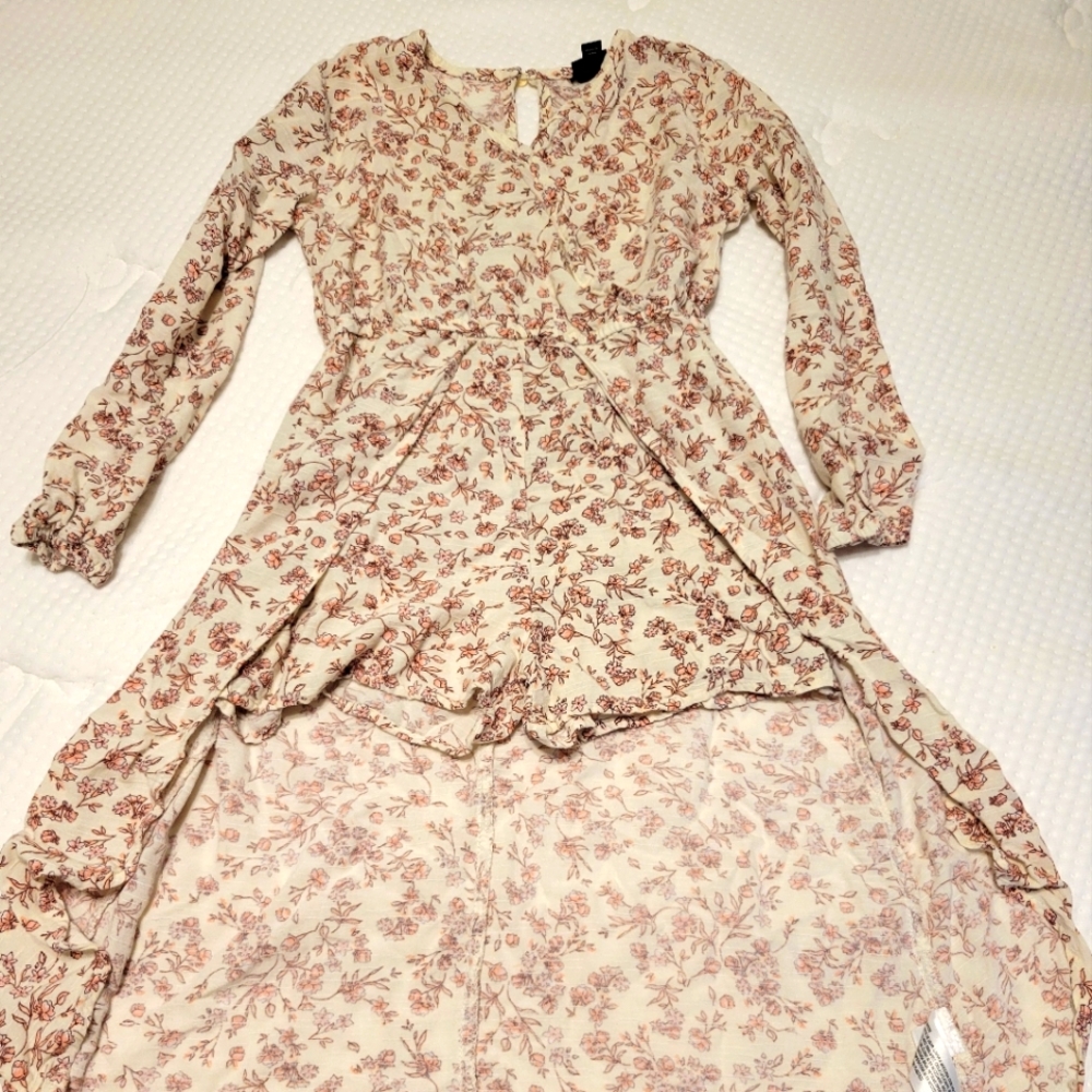 Long sleeve romper with high low skirt